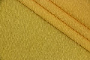 Тканина креп Італія (поліестер 100%, колір яйчний жовток, шир. 1,50 м)